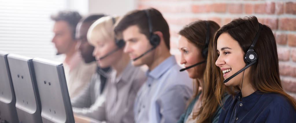 Female Customer Services Agent Working In A Call Center
